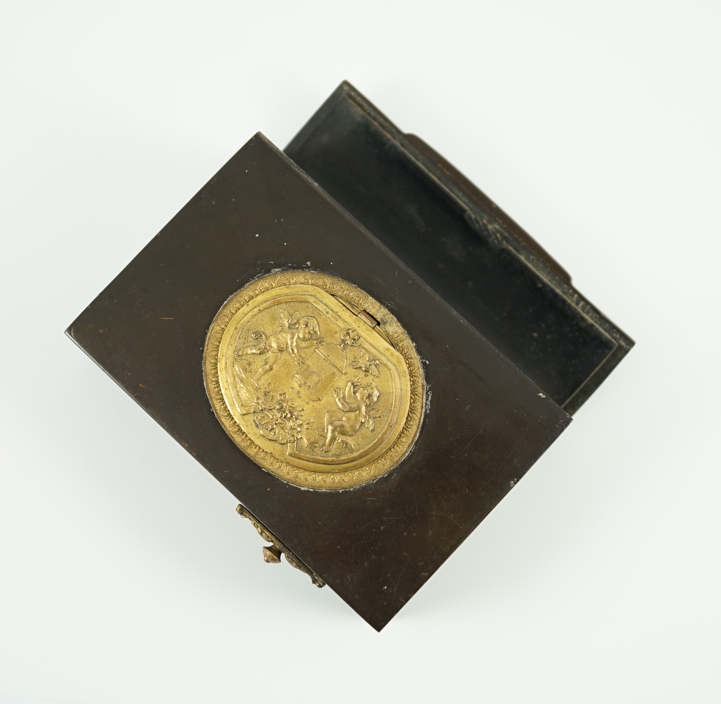 A late 19th century Swiss gilt metal mounted phenolic singing bird box, 10 x 7cm, 3cm high